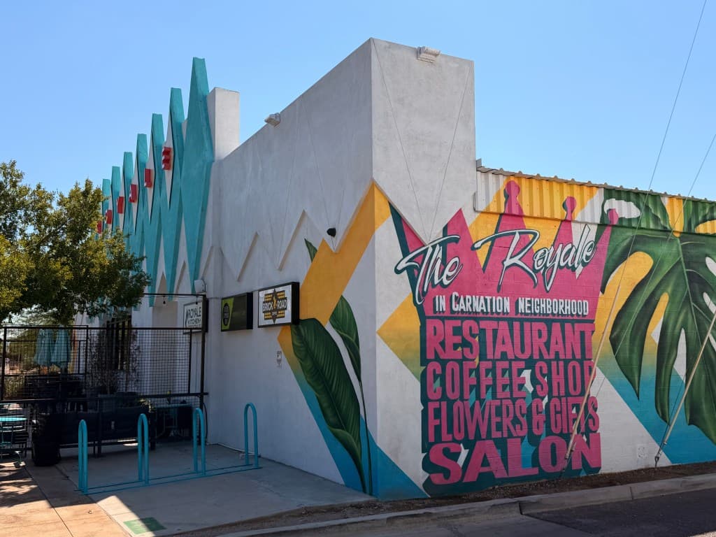 The colorful Royale exterior with Brick Road Coffee signage
