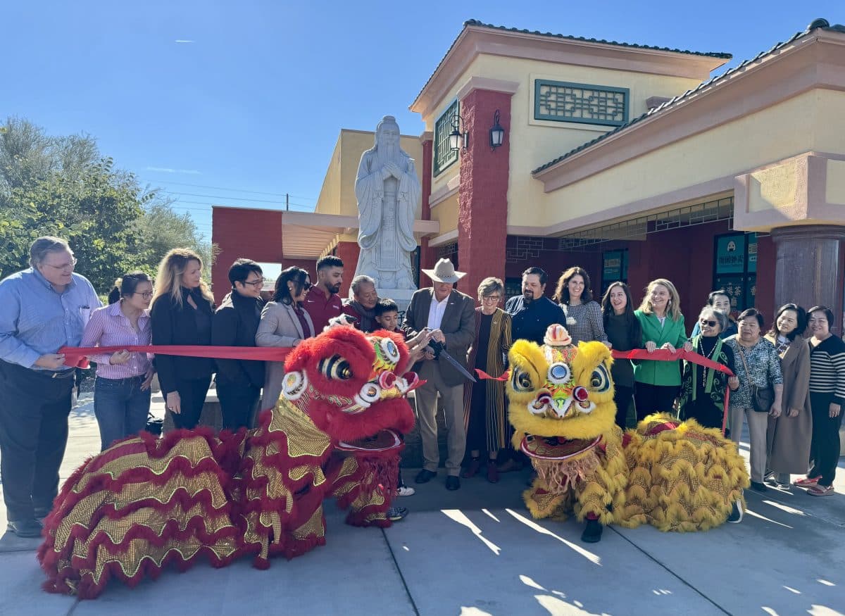 A ribbon-cutting celebration outside Haidilao